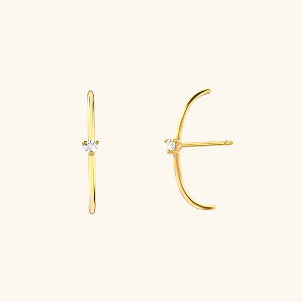Les boucles d'oreilles Arc diamanté
