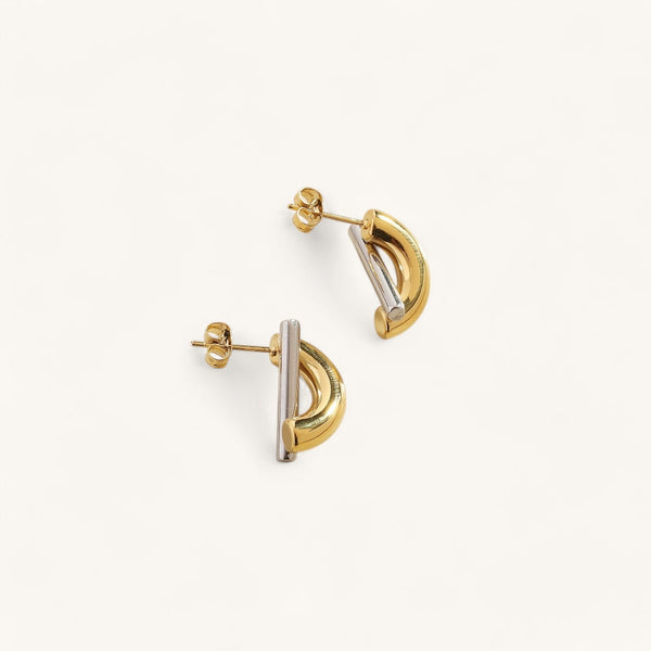 Les Boucles d’Oreilles Demi-Barre