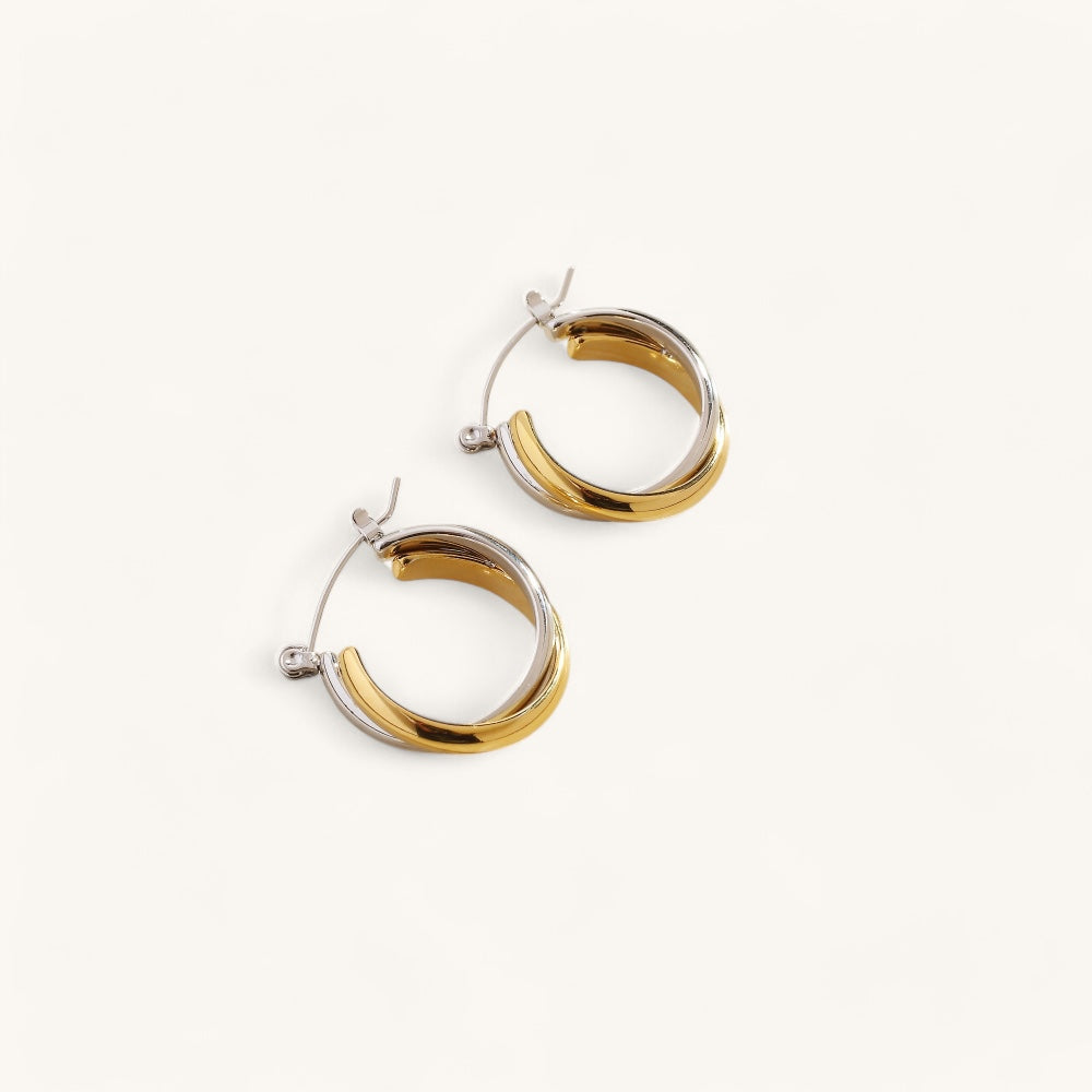Les Boucles d’Oreilles Double Torsade