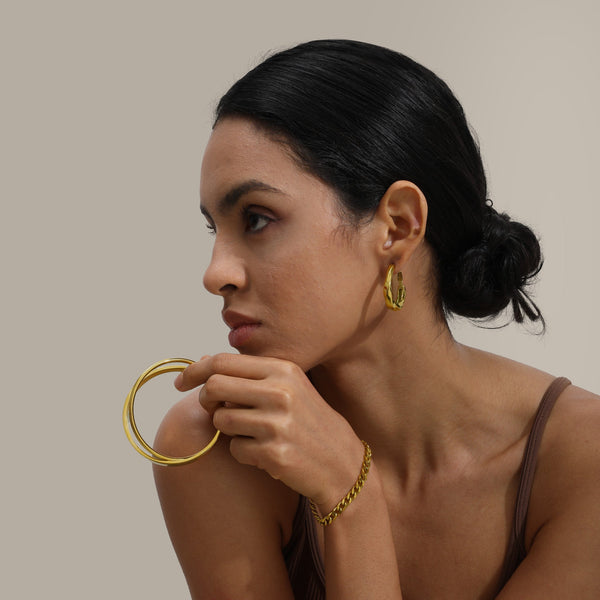 Les Boucles d’Oreilles Flora