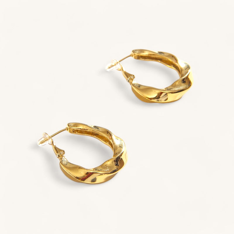 Les Boucles d’Oreilles Flora