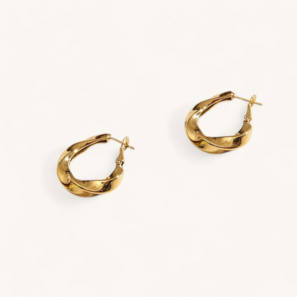 Les Boucles d’Oreilles Flora